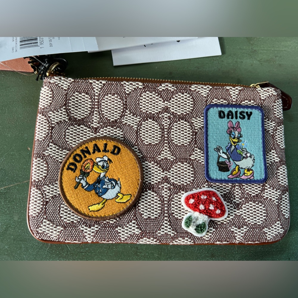 Daisy and Donald Coach wristlet